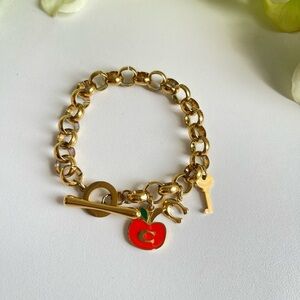CoachGold Chain Bracelet with Red Apple Charm